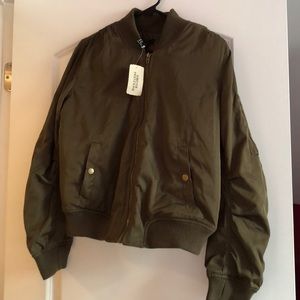 Olive green bomber jacket.
